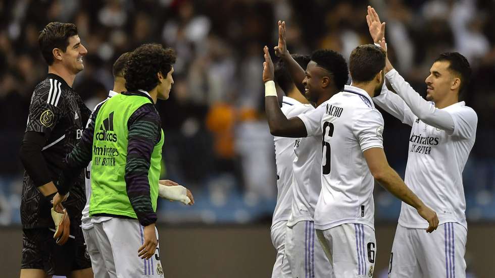 epa10400656 Real Madrid players celebrate after winning the Supercopa de Espana semi-final match between Real Madrid and Valencia, in Riyadh, Saudi Arabia, 11 January 2023.  EPA/STR