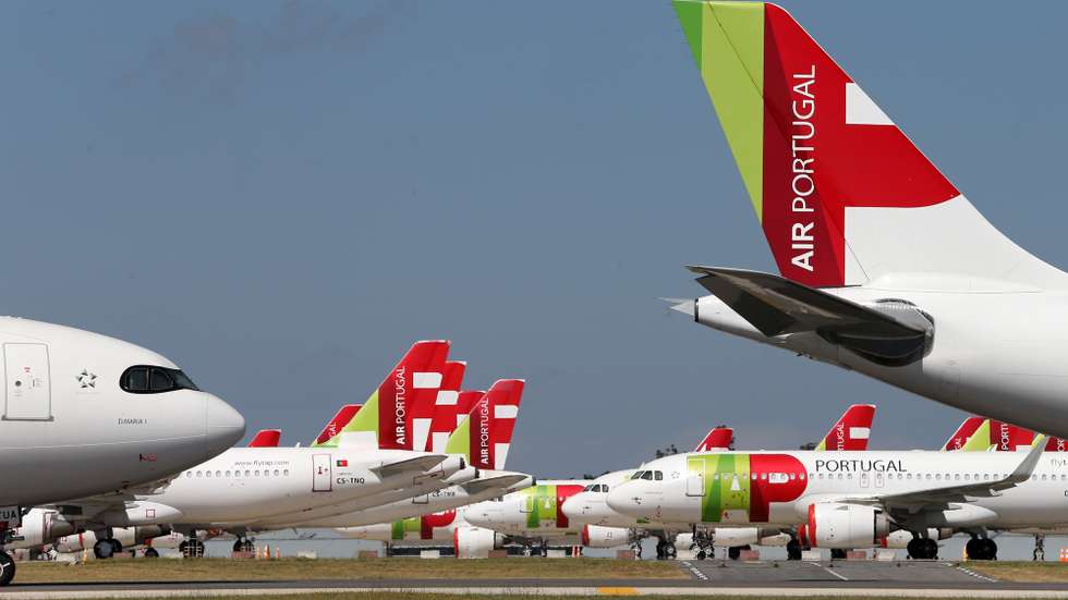epa08524023 A TAP Air Portugal aircraft grounded at Humberto Delgado airport closed for passenger traffic as part of the exceptional traffic measures to combat the epidemiological situation of Covid-19, in Lisbon, Portugal, 09 April 2020 (reissued 02 July 2020). The granting of state support to TAP has been under discussion since the airline's activity came to a standstill because of the coronavirus pandemic, with an agreed injection of up to 1,200 million euros.  EPA/MANUEL DE ALMEIDA