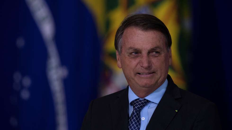 epa08810541 President of Brazil Jair Bolsonaro participates in the launch of the Alliance for Volunteering and the Friends of the Country Award, in Brasilia, Brazil, 09 November 2020.  EPA/Joedson Alves
