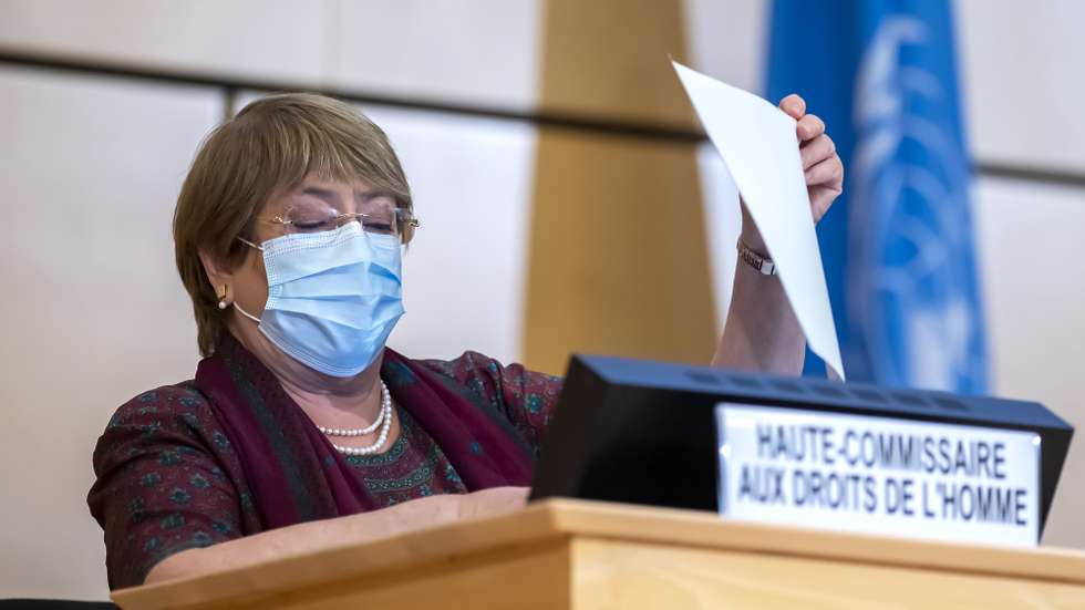 epa08667803 High Commissioner for Human Rights Michelle Bachelet read a document before his speech, during the opening of 45th session of the Human Rights Council, at the European headquarters of the United Nations in Geneva, Switzerland, 14 September 2020.  EPA/MARTIAL TREZZINI / POOL