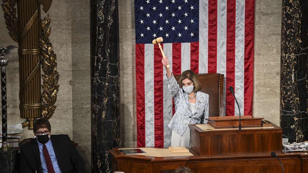 epa08917852 House Speaker Nancy Pelosi (D-Calif.) waves the gavel on the opening day of the 117th Congress at the US Capitol in Washington, DC, USA, 03 January 2021  EPA/Bill O'Leary / POOL
