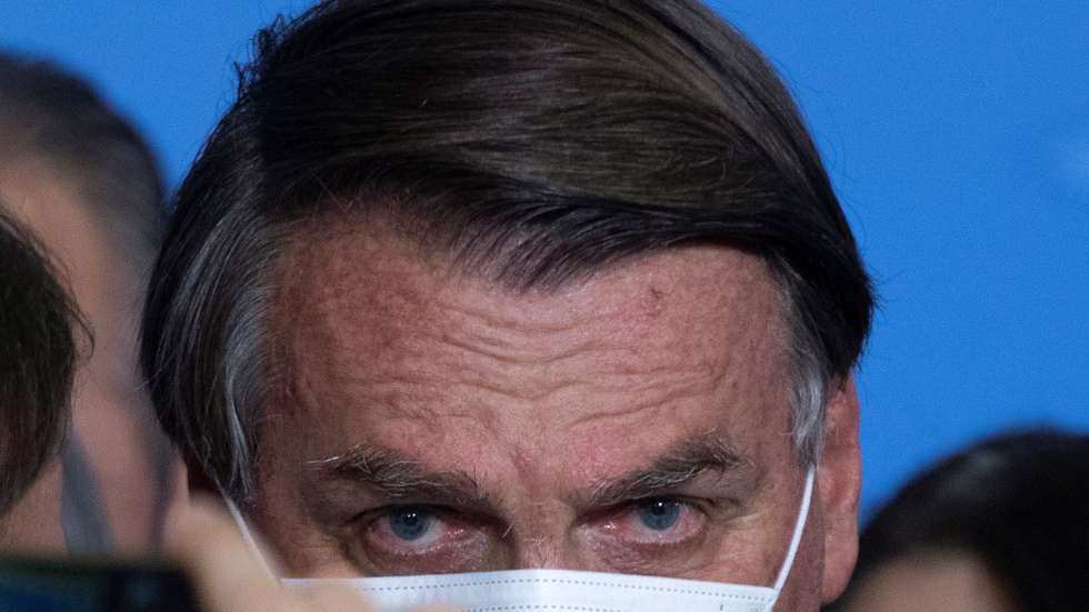 epa09294579 Brazilian President Jair Bolsonaro attends the launching of an agriculture program at Planalto Presidential Palace in Brasilia, Brazil, 22 June 2021. Brazil's Goverment announced some US $50 billion for investments in agriculture during 2021-2022.  EPA/JoÃ©dson Alves
