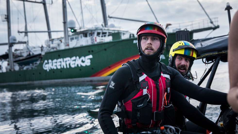 epa08610375 A handout photo made available by Greenpeace shows activists with Greenpeace Denmark preparing to swim towards the Dan oil field in the Danish North Sea, 18 August 2020. The activists swam from the Greenpeace ship Rainbow Warrior and planned to occupy the Dan Bravo oil rig in protest over oil and gas exploration in Denmark.  EPA/Andrew McConnell / GREENPEACE HANDOUT MANDATORY CREDIT: ANDREW MCCONNELL / GREENPEACE HANDOUT EDITORIAL USE ONLY/NO SALES/NO ARCHIVES