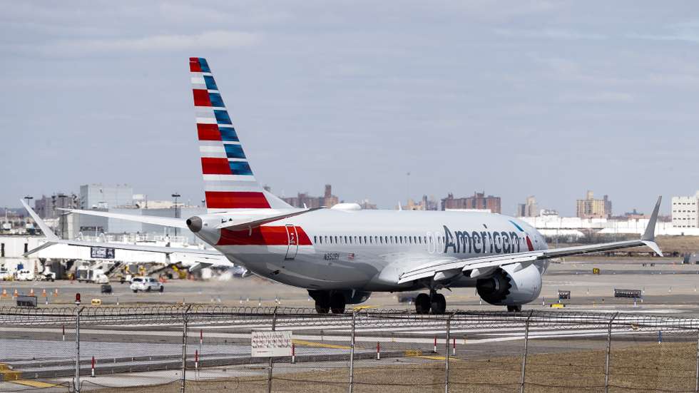 epa07432160 An American Airlines Boeing 737 Max 8 (Tail Number N350RV) prepares for takeoff at LaGuardia Airport in New York, New York, USA, 12 March 2019. Multiple countries around the world have ground the Boeing 737 Max 8 planes following two separate crashes involving the model.  EPA/JUSTIN LANE