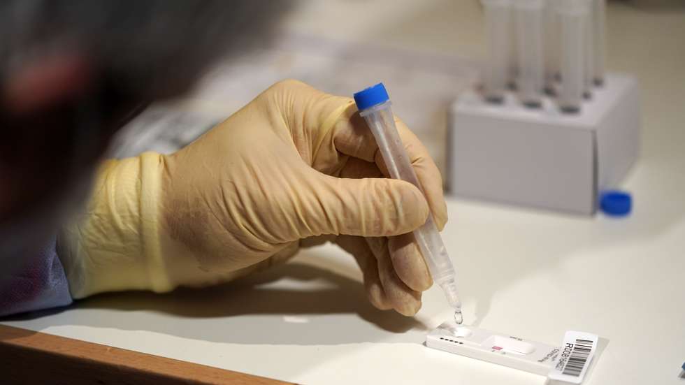 epa09007500 Health personnel conducts a rapid coronavirus test center in the Johannes church in Stuttgart, Germany, 12 February 2021. Countries around the world are taking increased measures to stem the widespread of the SARS-CoV-2 coronavirus which causes the Covid-19 disease.  EPA/RONALD WITTEK