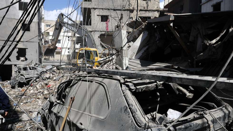 epa12871274 A bulldozer clears the rubble of destroyed buildings following an Israeli trike near the Rafik Hariri University Hospital (RHUH), in the Jnah District of Beirut, Lebanon, 06 April 2026. At least 04 people were killed and more than 35 others injured after an Israeli airstrike hit near Lebanon's largest public hospital in southern Beirut, the Lebanese Ministry of Health said. According to the Lebanese Ministry of Public Health, at least 1,470 people have been killed and more than 4,460 others injured in Israeli airstrikes across Beirut's southern suburbs and villages in southern Lebanon since the start of renewed hostilities.  EPA/WAEL HAMZEH