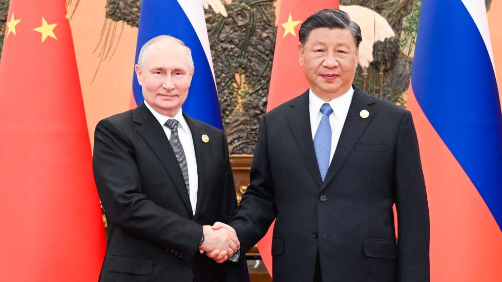 epa10925981 Chinese President Xi Jinping shakes hasnds with Russian President Vladimir Putin at the Great Hall of the People in Beijing, China, 18 October 2023. Putin is in Beijing for the third Belt and Road Forum for International Cooperation (BRF).  EPA/XINHUA / ZHANG LING CHINA OUT / UK AND IRELAND OUT  /       MANDATORY CREDIT  EDITORIAL USE ONLY  EDITORIAL USE ONLY