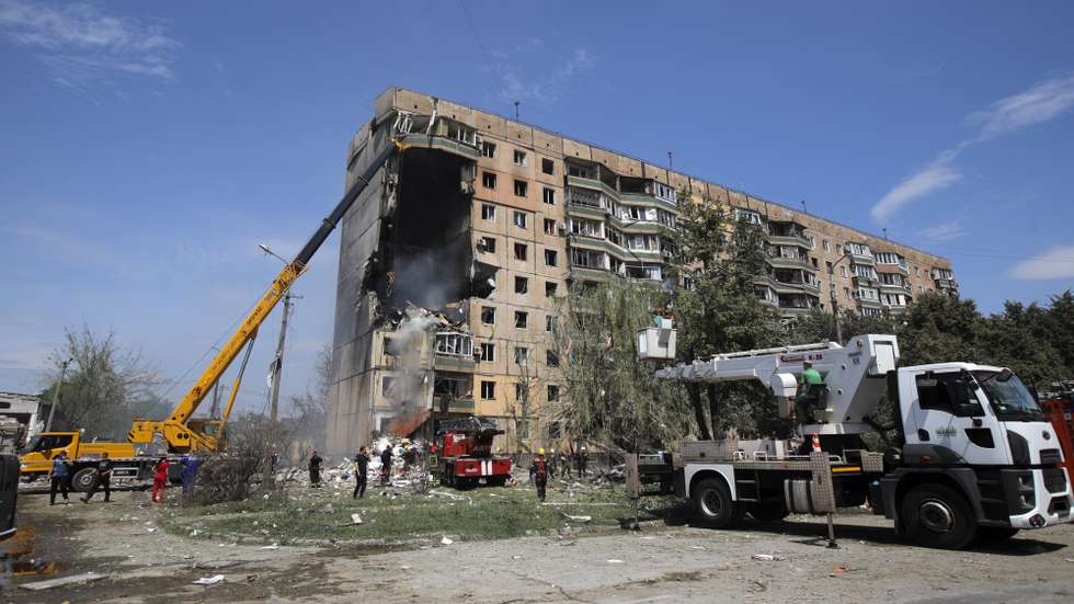 epa10778510 Ukrainian rescuers work at the site of a damaged residential building after shelling in the city of Kryvyi Rih, central Ukraine, 31 July 2023, amid the Russian invasion. At least four people died and 43 others were injured as a result of a Russian missile attack on the city of Kryvyi Rih, the State Emergency Service reported. Among the victims there is a 10-year-old child, the head of the Dnipropetrovsk Regional Military Administration, Sergey Lysak wrote on telegram, adding that a search operation at the site was ongoing. Russian troops entered Ukrainian territory in February 2022, starting a conflict that has provoked destruction and a humanitarian crisis.  EPA/ARSEN DZODZAIEV