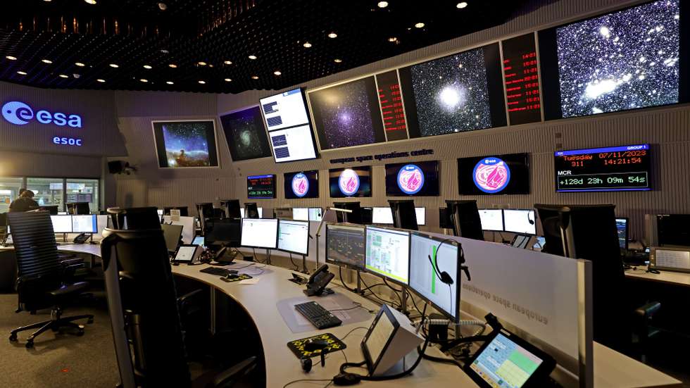 epa10962418 A view inside of the main control room with the first images of the Euclid space telescope on TV screens at the European Space Operations Centre (ESA/ESOC) in Darmstadt, Germany, 07 November 2023. Euclid mission will release the first full-colour images of the cosmos on 07 November. ESA&#039;s Euclid space telescope is designed to study the composition and evolution of the dark universe.  EPA/RONALD WITTEK