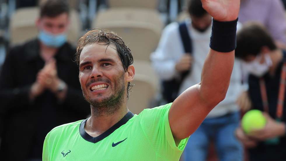 epa09249751 Rafael Nadal of Spain celebrates winning against Cameron Norrie of Britain during their third round match at the French Open tennis tournament at Roland Garros in Paris, France, 05 June 2021.  EPA/CHRISTOPHE PETIT TESSON