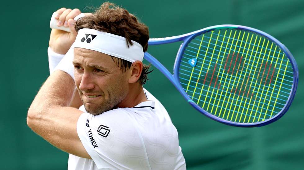 epa13072573 Casper Ruud of Norway hits a backhand during his Men's Singles first round match against Hubert Hurkacz of Poland at the Wimbledon Championships in London, Britain, 29 June 2026.  EPA/NEIL HALL