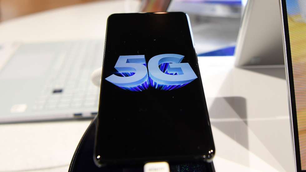 epa08545341 A 5G phone at a store in London, Britain, 14 July 2020. According to news reports, the British government is to exclude leading Chinese technology company Huawei from involvement in Britain's future 5G telecoms networks. Dowden also said telecoms operators in UK will have to remove by 2027 any Huawei equipment. Telecoms operators will also not be allowed to purchase Huawei equipment by the end of 2020.  EPA/ANDY RAIN