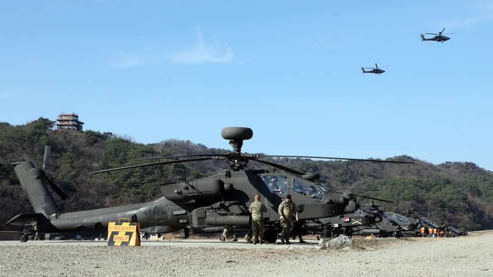 epa10974213 South Korean and US Apache helicopters conduct joint training at the US Camp Rodriguez live-fire range in Pocheon, around 50 kilometers northeast of Seoul, South Korea, 14 November 2023.  EPA/YONHAP SOUTH KOREA OUT