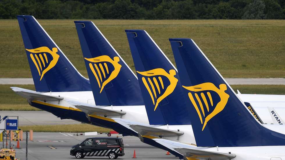 epa08520272 Ryanair aircraft at Stansted Airport in London, Britain, 01 July 2020. The UK government is set to announce that it is to form so called 'air bridges' with other countries so that people can go on holiday this summer. The global travel industry has been hit hard by four months of lockdown. Countries around the world are taking increased measures to stem the widespread of the SARS-CoV-2 coronavirus which causes the Covid-19 disease.  EPA/ANDY RAIN
