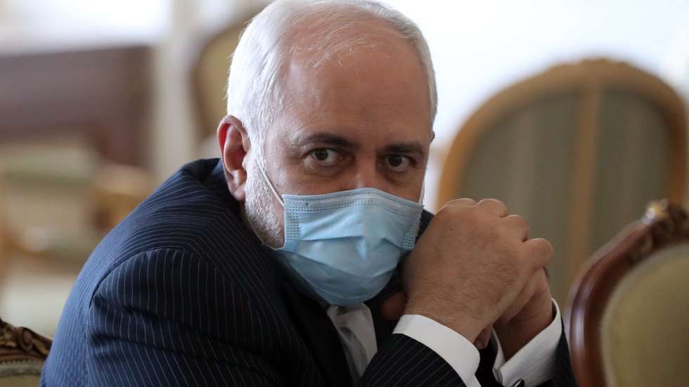 epa09027793 Iranian Foreign Minister Mohammad Javad Zarif during a meeting with IAEA director Grossi in Tehran, Iran, 21 February 2021. The director of the International Atomic Energy Agency (IAEA), Grossi is in Tehran to meet with Iranian officials over Iran's disputed nuclear programm.  EPA/ABEDIN TAHERKENAREH