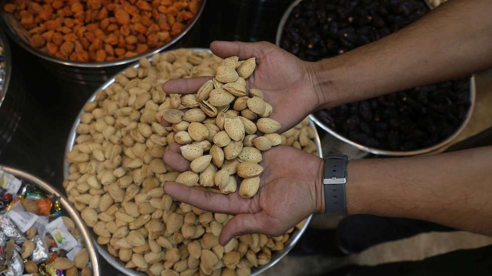 epa12287784 A vendor displays raw almonds at a dry fruit shop in Srinagar, the summer capital of Indian Kashmir, 07 August 2025. In an escalation of trade tensions between the United States and India, US President Donald Trump, on 06 August 2025, signed an executive order imposing a 25 percent ad valorem tariff on all Indian imports into the United States. The ad valorem duty imposed in Executive Order 14257 would apply in addition to the ad valorem duty imposed in section 2 of the order. This effectively means some categories of Indian exports may face a combined tariff burden of over 50 percent, depending on their classification.  EPA/FAROOQ KHAN