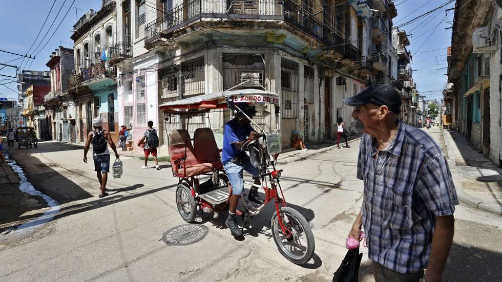 epa13003356 People walk along a street in Havana, Cuba, 29 May 2026.  EPA/ERNESTO MASTRASCUSA