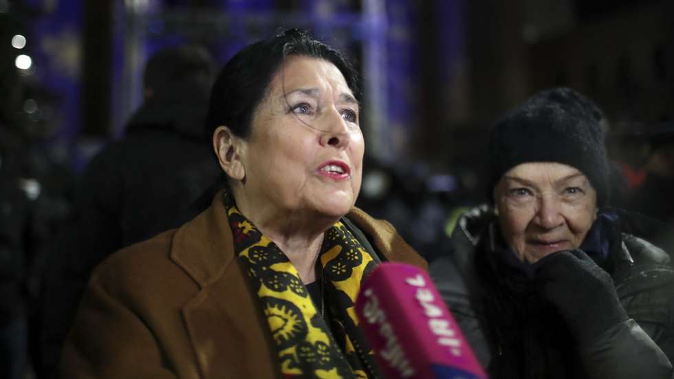epa11776929 Georgian President Salome Zurabishvili speaks during a protest after Mikheil Kavelashvili is elected as new Georgia's President following voting at the Parliament building during presidential elections in Tbilisi, Georgia, 14 December 2024. For the first time in Georgia, the president is being elected by an electoral college in the parliament building. President Salome Zourabichvili, declaring herself the only lawful representative of power in the country, said that she would not resign from her post, stating that 'with an illegitimate parliament, there cannot be legitimate presidential elections'.  EPA/DAVID MDZINARISHVILI
