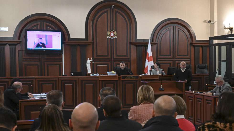 epa10376245 Georgia's former President Mikhail Saakashvili (L) appears via video link from the hospital during a hearing for his release on health grounds, in Tbilisi city court, Georgia, 22 December 2022. Saakashvili secretly arrived in Georgia the day before the municipal elections in October 2021, after which he was arrested and placed in a prison in the city of Rustavi. He went on a hunger strike, calling himself a political prisoner. After the deterioration of the former president's condition, he was transferred to a prison hospital, and later to a military hospital. In December, Saakashvili continued to serve his sentence in a prison in Rustavi, but in May 2022 he was taken to the private clinic in Tbilisi, where he remains to this day.  EPA/ZURAB KURTSIKIDZE