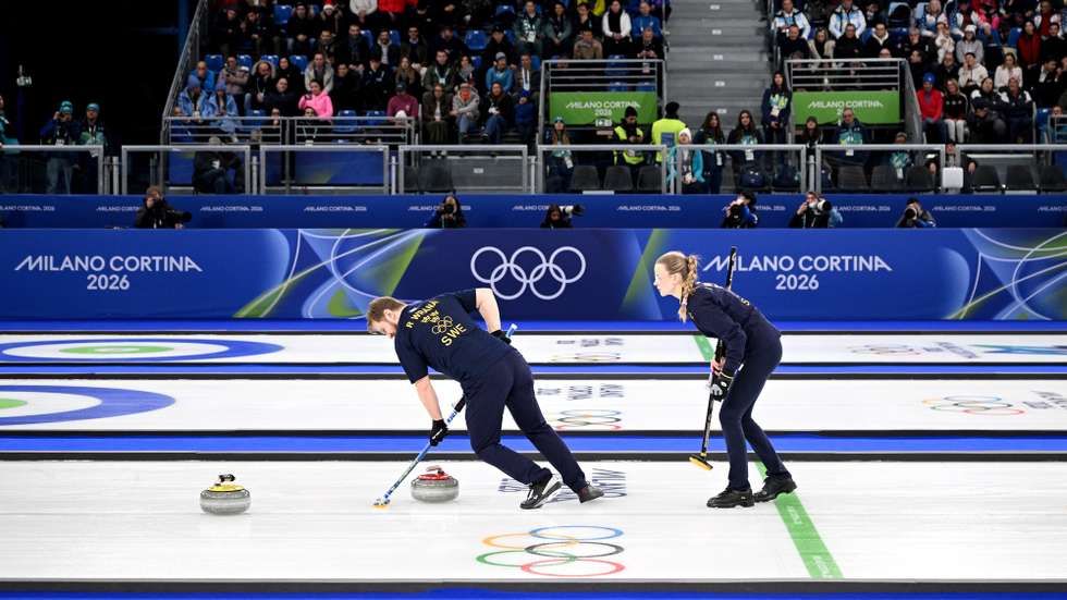epa12724460 Isabella Wranaa and Rasmus Wranaa of Sweden in action during the gold medal match between Sweden and the USA in the Mixed Doubles of the Curling competition, at the Milano Cortina 2026 Winter Olympic Games in Cortina d'Ampezzo, Italy, 10 February 2026.  EPA/JURE MAKOVEC