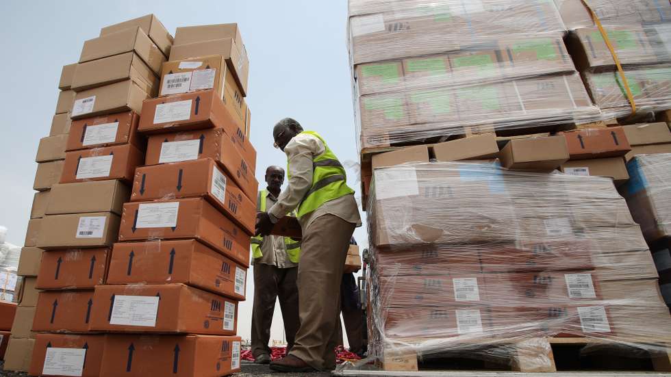 epa10167640 Workers unload the humanitarian aid and relief goods for Sudan floods victims that were sent from UAE's emirate of Dubai at Khartoum Airport, Sudan, 07 September 2022. In implementation with the directives and vision of the United Arab Emirates' leadership and the express instructions of His Highness Sheikh Mohammed bin Rashid Al Maktoum, Vice President, Prime Minister of the UAE, and Ruler of Dubai, the International Humanitarian City (IHC) based in Dubai coordinating with World Humanitarian Organization (WHO) and International Federation of Red Cross and Red Crescent Societies are working to uphold a swift and effective response to crises prompted by natural and artificial disasters in areas in the world, by sending the Humanitarian Aid and relief goods to the victims of Sudan floods.  EPA/ALI HAIDER