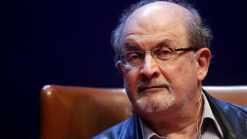 epa10117473 (FILE) - Indian-British writer Salman Rushdie presents his book 'Two Years Eight Months and Twenty-Eight Nights' in Aviles, Spain, 07 October 2015 (reissued 12 August 2022). Rushdie and an interviewer were attacked while on stage at an event in Chautauqua, New York State, USA, on 12 August 2022. The suspect was taken into custody, New York State police said. Rushdie, who was apparently stabbed in the neck, was transported to a hospital. His condition is not yet known.  EPA/JL CEREIJIDO *** Local Caption *** 53580620