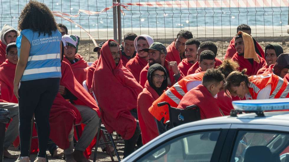 epa10984568 Migrants arrive at Arrecife port in Lanzarote island, the Canaries, Spain, 19 November 2023, after being rescued by Salvamar Al Nair rescue ship. In all, 49 people of North African origin, including 3 women and a minor, have been rescued from a small wooden boat  east of Lanzarote.  EPA/ADRIEL PERDOMO