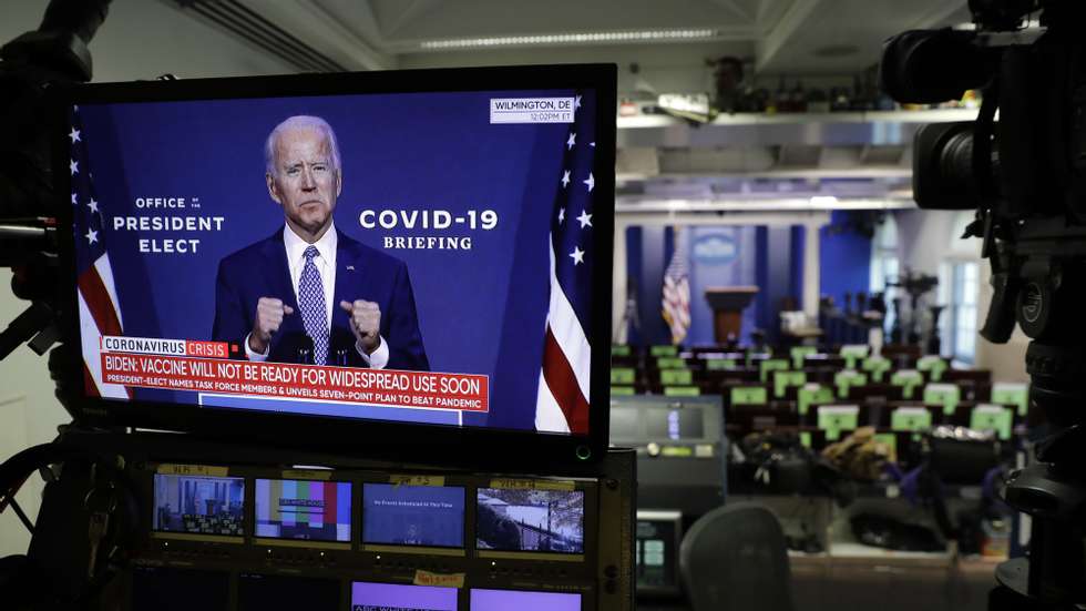 epa08810139 US President-elect Joe Biden is seen during his statement on television monitors in the briefing room at the White House in Washington, DC, USA, 09 November 2020.  EPA/Yuri Gripas / POOL