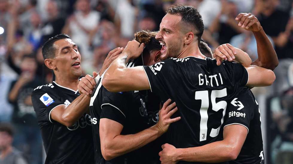 epa10150867 Juventusâ€™ Arkadiusx Milik (hidden) jubilates after scoring the 2-0 lead during the Italian Serie A soccer match Juventus FC vs Spezia Calcio at the Allianz Stadium in Turin, Italy, 31 August 2022.  EPA/ALESSANDRO DI MARCO