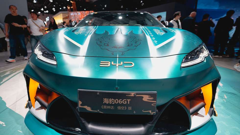 epa12054011 A BYD model 06GTcar is on display at the booth of Chinese carmaker BYD during the first public day of the Shanghai Auto show, in Shanghai, China, 25 April 2025. The 21st Shanghai International Automobile Industry Exhibition will be held from 23 April to 02 May. Shanghai Auto will feature over 70 automakers and 100 new models.  EPA/ALEX PLAVEVSKI