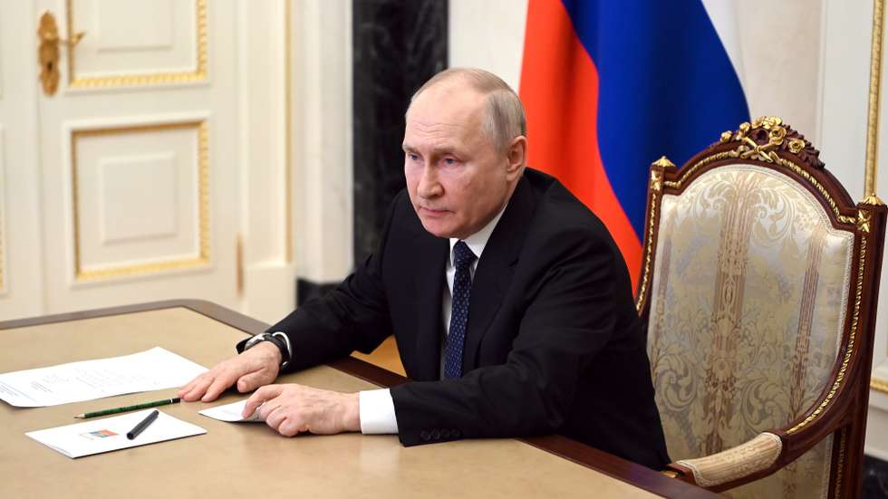 epa10752114 Russian President Vladimir Putin attends a video conference from the Moscow Kremlin to discuss an emergency on Crimean Bridge, in Moscow, Russia 17 July 2023. The Investigative Committee of Russia said that one of the sections of the Crimean bridge was damaged in the night of 16 to 17 July. Two civilians, a man and a woman, were killed while driving a car across the bridge; their minor daughter was injured in the incident, the statement added. Russia has blamed 'special services of Ukraine' for the 'attack', and said it launched a criminal investigation into the incident.  EPA/ALEXANDER KAZAKOV / SPUTNIK / KREMLIN POOL