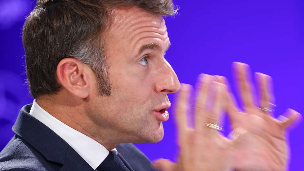 epa11637792 French President Emmanuel Macron takes part in a panel discussion during the Berlin Global Dialogue (BGD) summit, in Berlin, Germany, 02 October 2024. The international forum, which aims to address global business and political challenges, runs from 01 to 02 October 2024.  EPA/HANNIBAL HANSCHKE