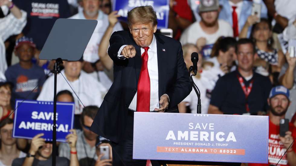 epa09424231 Former US President Donald Trump participates in a rally sponsored by the Alabama Republican Party at the York Family Farms in Cullman, Alabama, USA, 21 August 2021. The Cullman City Council declared a COVID-19 state of emergency ahead of the rally.  EPA/ERIK S. LESSER