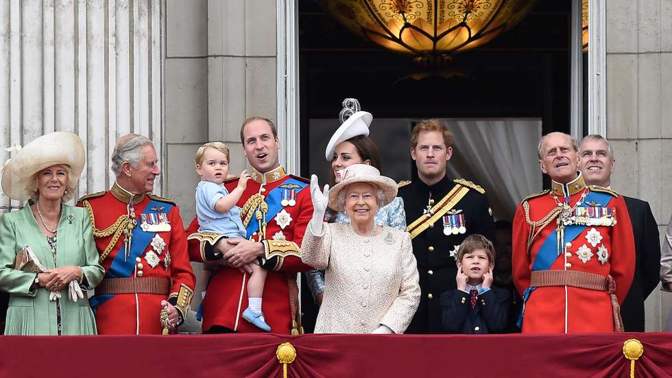 epa10170507 (FILE) - A picture dated 13 June 2015 shows Britain's Queen Elizabeth II (C) and members of the Royal Family on the balcony of Buckingham Palace following the traditional Trooping the Colour Ceremony in London, Britain (reissued 08 September 2022). According to a statement issued by Buckingham Palace on 08 September 2022, Britain's Queen Elizabeth II has died at her Scottish estate, Balmoral Castle, on 08 September 2022. The 96-year-old Queen was the longest-reigning monarch in British history. From left are: Camilla, Duchess of Cornwall, Prince Charles, Prince George, Prince William, Duke of Cambridge, Catherine, Duchess of Cambridge, Prince Harry, Prince Philip, Duke of Edinburgh and Prince Andrew. Boy bottom right is unidentified.  EPA/FACUNDO ARRIZABALAGA