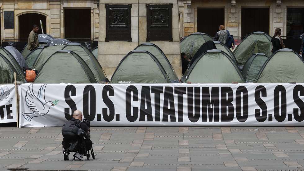 epa11861631 An encampment of peasant leaders from the Catatumbo region at the Plaza de Bolivar in Bogota, Colombia, 29 January 2025. The encampment demands that the government address the violence generated by clashes between the National Liberation Army (ELN) guerrillas and the 33rd Front of the FARC dissidents which has caused the displacement of more than 40,000 people.  EPA/Mauricio Duenas Castaneda