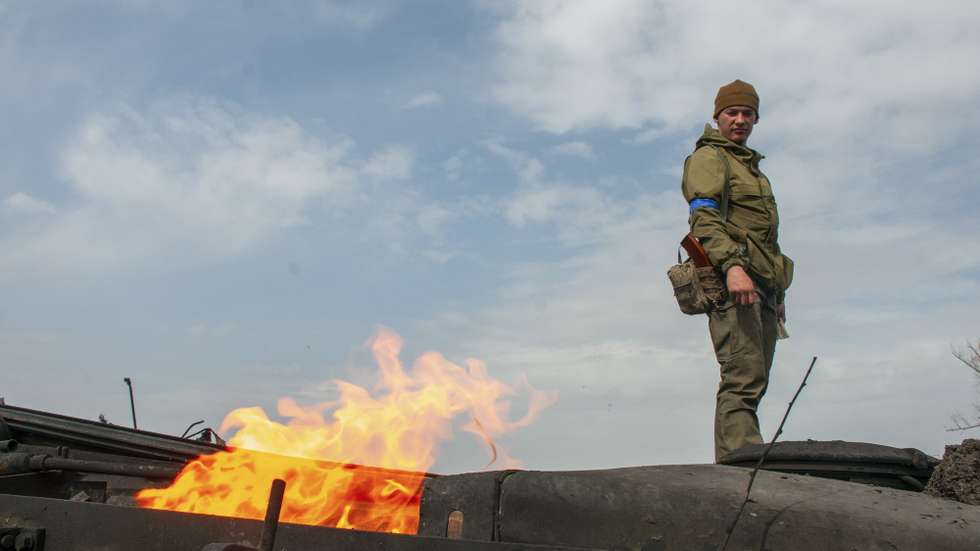 epa09863659 Ukrainian soldiers inspect destroyed Russian positions in the recaptured by the Ukrainian army Mala Rohan village, near Kharkiv, northeast Ukraine, 01 April 2022. Mala Rohan and the area around had recently been recaptured by the Ukrainian army from Russian forces. On 24 February Russian troops had entered Ukrainian territory in what the Russian president declared a 'special military operation', resulting in fighting and destruction in the country, a huge flow of refugees, and multiple sanctions against Russia.  EPA/VASILIY ZHLOBSKY