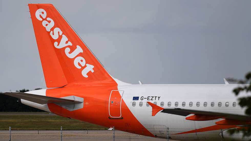 epa08520169 An EasyJet aircraft at Stansted Airport in London, Britain, 01 July 2020. EasyJet has announced to cut a third of its workforce due to the dramatic fall in demand for air travel caused by the coronavirus pandemic.Countries around the world are taking increased measures to stem the widespread of the SARS-CoV-2 coronavirus which causes the Covid-19 disease. EPA/ANDY RAIN