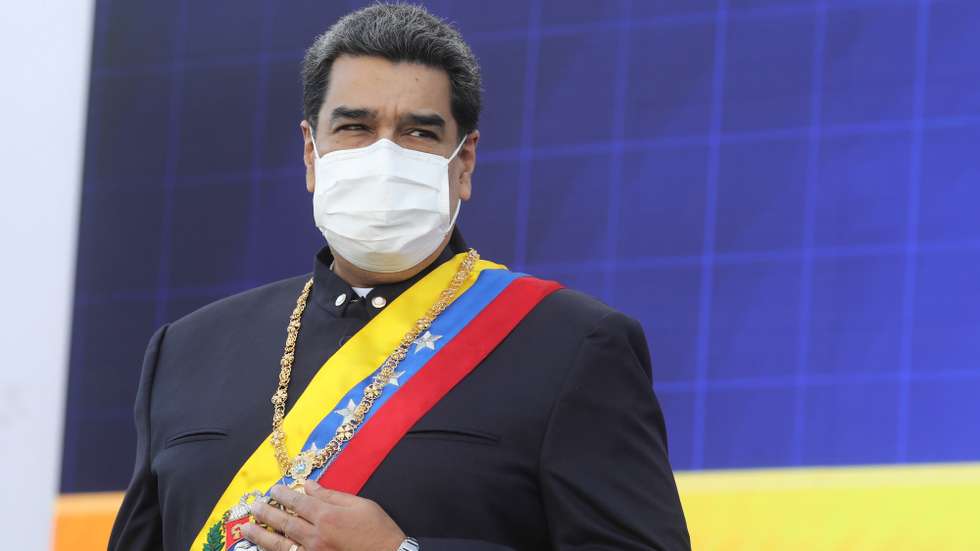epa09324893 A handout photo made available by Miraflores Press shows Venezuelan President Nicolas Maduro during the celebration of the 210th anniversary of the signing of the independence act, in Caracas, Venezuela, 05 July 2021. Maduro affirmed that 'Celebrating independence today, 210 years after the signing of the act, means a commitment to recover and restore the socialist welfare state built in these years of the Bolivarian revolution,' said the President ahead of the traditional parade of the 05 July and after presiding over a promotion ceremony.  EPA/Miraflores Press HANDOUT  HANDOUT EDITORIAL USE ONLY/NO SALES