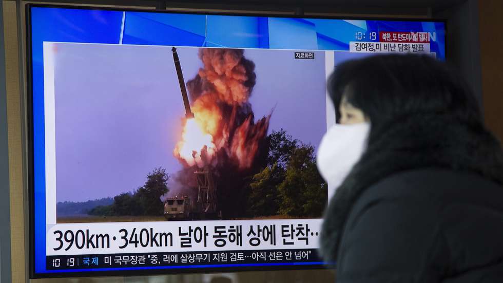 epa10479057 A woman watches a news report concerning a recent North Korean missile launch at a station in Seoul, South Korea, 20 February  2023. According to South Korea's Joint Chiefs of Staff (JCS), North Korea launched two ballistic missiles into the East Sea.  EPA/JEON HEON-KYUN