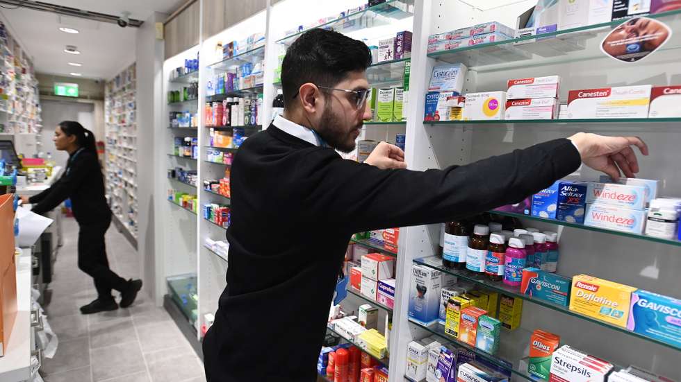 epa10617062 Pharmacists at a pharmacy in London, Britain, 09 May 2023. The UK Government has announced plans to "transform" health care by giving pharmacists more control to write prescriptions for patients in England. Under the new plans patients will be able to receive prescription medicines and oral contraception without seeing a general practitioner, relieving the pressure on General Practice surgeries.  EPA/ANDY RAIN