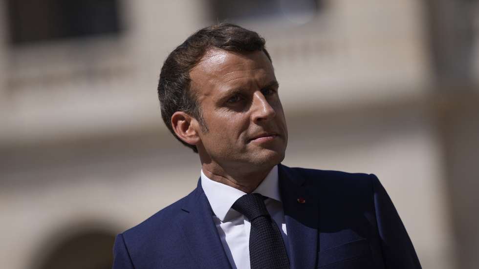 epa09356816 French President Emmanuel Macron attends a farewell ceremony for the French armed forces chief of staff, Gen. Francois Lecointre at the Invalides monument in Paris, France, 21 July 2021.  EPA/DANIEL COLE / POOL MAXPPP OUT