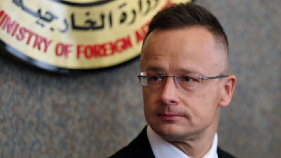 epa09778610 Hungarian Foreign Minister Peter Szijjarto  looks on during a joint press conference with the Egyptian foreign minister (not pictured) in Cairo, Egypt, 23 February 2022. The Hungarian Foreign Minister is on an official visit to Egypt.  EPA/KHALED ELFIQI