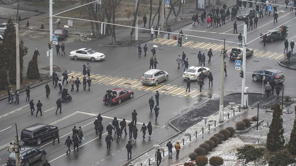 epa09667766 People protest during rally over a hike in energy prices in Almaty, Kazakhstan, 05 January 2022. Protesters stormed the mayor's office in Almaty, as Kazakh President Kassym-Jomart Tokayev declared a state of emergency in the capital until 19 January 2022.  EPA/STR