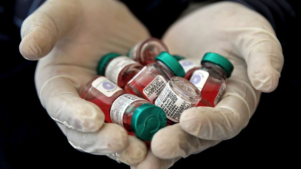 epa09791724 An Indian health volunteer shows vials containing the pulse polio oral vaccine, during a pulse polio campaign in Bangalore, India, 28 February 2022. The Pulse Polio National Immunisation Programme is held after a gap amid coronavirus COVID-19, children in the state between the ages of 0-5 years are being administered pulse polio drops to get rid of the disease during the polio eradication campaign for a polio-free India.  EPA/JAGADEESH NV