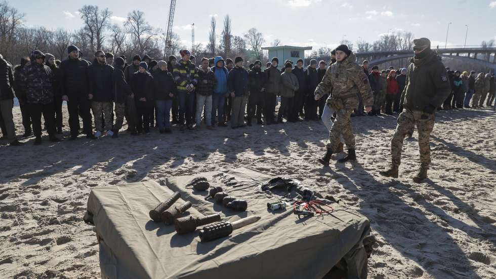 epa09753193 Ukrainians attend an open military training for civilians organized by Right Sector activists in Kiev, Ukraine, 13 February 2022. According to a survey conducted by the Kiev International Institute of Sociology (KIIS) from December 2021, 50.2 percent of Ukrainians said they would resist in case of a Russian military intervention into their city, town or village. Every third respondent to the poll said they were ready to engage in armed resistance, and 21.7 percent said they were ready to participate in civil resistance actions.  EPA/SERGEY DOLZHENKO