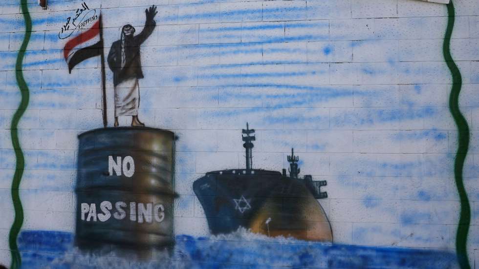 epa11166253 A graffiti on a wall depicts a Houthi fighter stopping an Israeli ship off the coast of Yemen, in Sana'a, Yemen, 19 February 2024. Yemen's Houthis have claimed responsibility for a new missile attack on UK-registered cargo ship in the Gulf of Aden off the coast of Yemen, according to a statement by Houthi military spokesman Yahya Sarea. The attack came just a day after the US forces launched five strikes on Houthi targets, including an unmanned underwater vessel. The US designation of Yemen's Houthis as a 'Specially Designated Global Terrorist group' came into effect on 16 February, due to their increased attacks on shipping lanes in the Red Sea and the Gulf of Aden since November 2023. The US Department of Defense announced in December 2023 a multinational operation to safeguard trade and protect ships in the Red Sea in response to the escalation of Houthi attacks.  EPA/YAHYA ARHAB