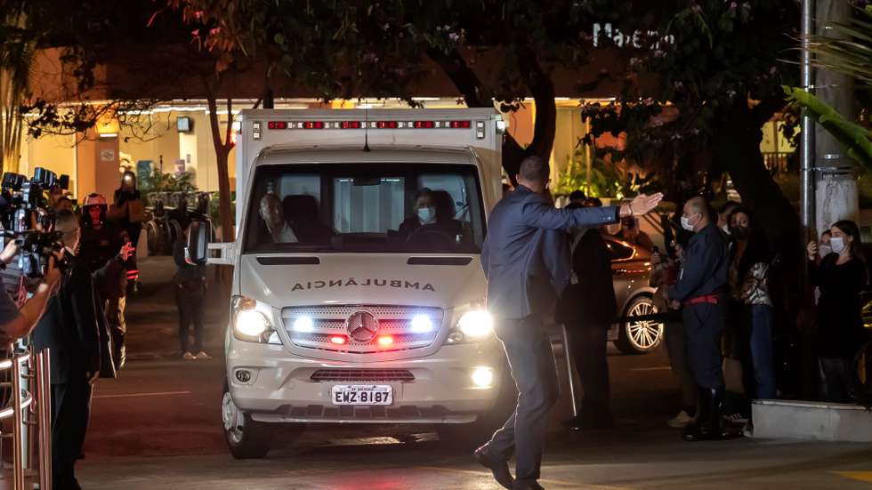 epa09345091 An ambulance transfers the president of Brazil, Jair Bolsonaro, to the Vila Nova Star Hospital, in Sao Paulo, Brazil, 14 July 2021. Brazilian President Jair Bolsonaro arrived in Sao Paulo from Brasilia to assess whether he should undergo an 'emergency' surgery for an 'intestinal obstruction,' official sources reported.  EPA/Sebastiao Moreira