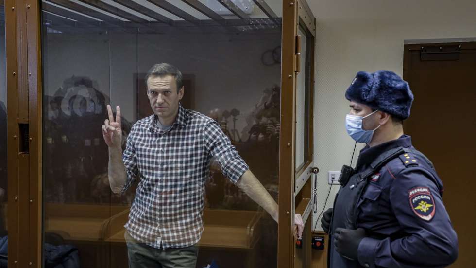 epa09108968 (FILE) Russian opposition leader Alexei Navalny gestures inside a glass cage prior to a hearing at the Babushkinsky District Court in Moscow, Russia, 20 February 2021 (reissued 31 March 2021). Russian opposition leader Alexei Navalny, who serves his 2,5 years sentence in a prison colony in the town of Pokrov in the Vladimir region, announced he is going on hunger strike in a protest of mistreatment in the prison.  EPA/YURI KOCHETKOV *** Local Caption *** 56711412