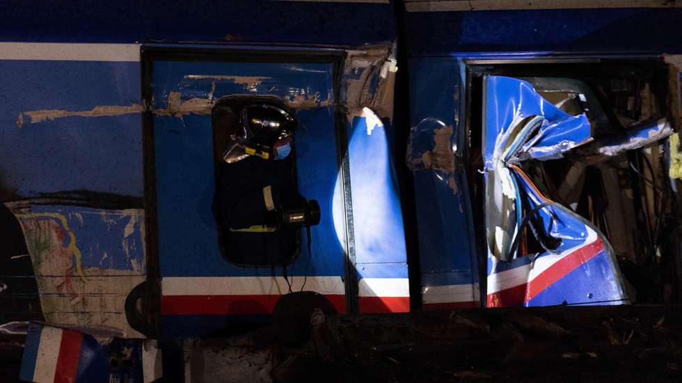epa10496351 Firefighters and rescue crews work to extricate passengers from trains after a collision near Larissa city, Greece, 01 March 2023. The two trains – a passenger train travelling from Athens to the northern city of Thessaloniki, and a cargo train from Thessaloniki to Larissa, collided head-on outside the central Greek city, Konstantinos Agorastos, the governor of the Thessaly region told local media. Sixteen people have been killed and at least 85 injured, and 250 passengers were evacuated safely to Thessaloniki on buses.  EPA/ACHILLEAS CHIRAS