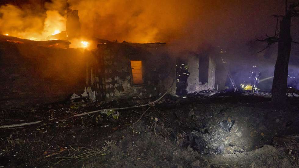 epa12545230 Ukrainian rescuers work at the site of a Russian strike on a residential area in Kharkiv, northeastern Ukraine, 24 November 2025, amid the Russian invasion. At least four people were killed and dozens injured, including two children, after overnight Russian strikes in Kharkiv, the head of the Kharkiv Military Administration, Oleg Synegubov, reported.  EPA/SERGEY KOZLOV